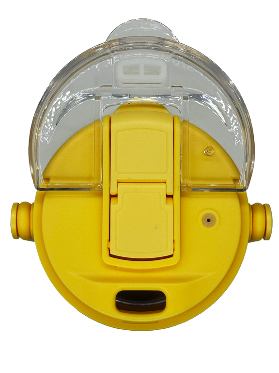 top view of a yellow lid showing sipping lid