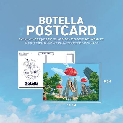 Botella postcard set designed for National Day, featuring a black-and-white hibiscus flower postcard and a colorful postcard depicting Petronas Towers, red balloons, and green trees, shown with dimensions of 15 cm by 10 cm against a blue sky background.